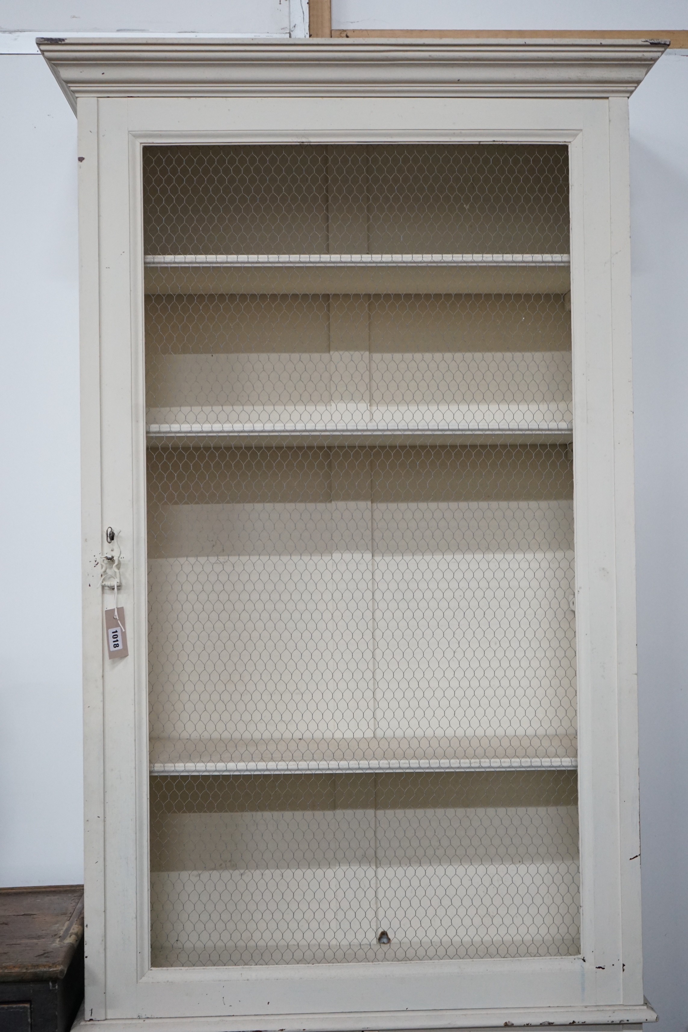 A painted side cabinet, width 83cm, depth 33cm, height 230cm